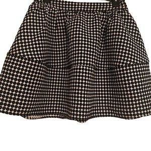 Black polka dot mini skirt